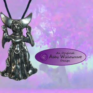 Pewter pendant of a robed figure with antlers and outstretched arms against purple textured background