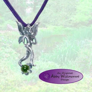 Sterling silver pendant featuring a stylized face with pointed ears and a green stone, suspended from a purple cord