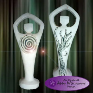 Two white sculptural candle holders with elongated forms: left figure features a spiral design on the torso, right figure displays a tree design on the lower body