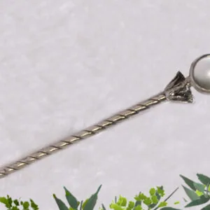 Ornate wand with twisted silver shaft and pearl sphere top with decorative cone base