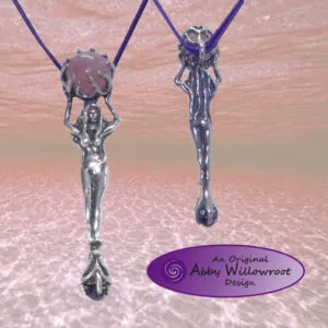 Two sterling silver wand pendants hanging from purple cords against a pink textured background