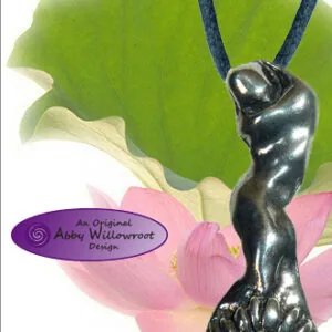 Pewter pendant with twisted figure design on cord, displayed with pink lotus flower and green leaf