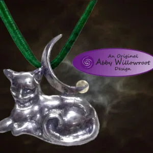 Sterling silver cat pendant with crescent moon detail on green cord
