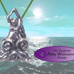 Silver pendant depicting a seated mother goddess figure suspended over ocean water with sun reflecting on surface