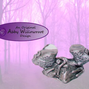 Decorative wand stand with ornate carved details on pink misty forest background