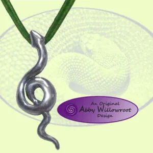 Pewter snake pendant with spiral coil design on green cord against pale yellow background