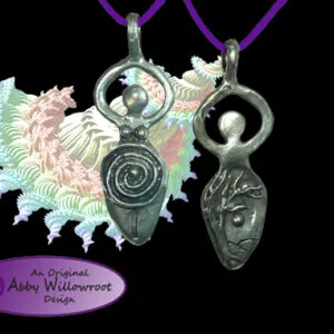Two pewter pendants on purple cords: left pendant features spiral and goddess moon designs with colorful enamel accents, right pendant shows a seated goddess figure
