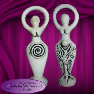 Two white stone goddess figurines with circular heads against magenta background, one with spiral design, one with tree pattern