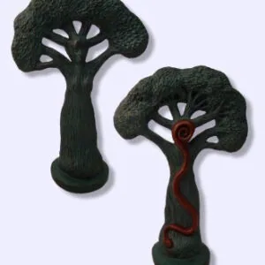 Two decorative tree figurines with textured green canopies and trunk bases, one plain and one with red details